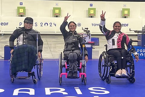 Paris Paralympics 2024: India's Avani Lekhara, centre, and Mona Agarwal, right, pose for photos after winning the gold medal and bronze medal